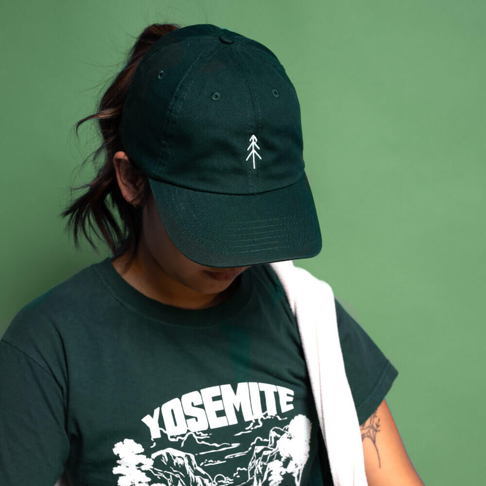 Girl with green baseball cap